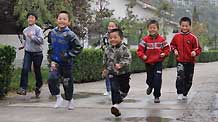 This photo taken by Qi Lin on October 31, 2009 shows children playing together in SOS Village in Kaifeng, central China's Henan province.