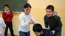 The picture taken on November 20, 2009 shows me (3rd, R) acting as a policewoman at a theater lesson in Madrid, Spain.