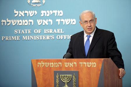 Israeli Prime Minister Benjamin Netanyahu speaks during a news conference in his office in Jerusalem November 25, 2009. Netanyahu announced on Wednesday a 10-month freeze on the construction of Jewish settlements on the West Bank in a bid to revive the peace talks with the Palestinians.