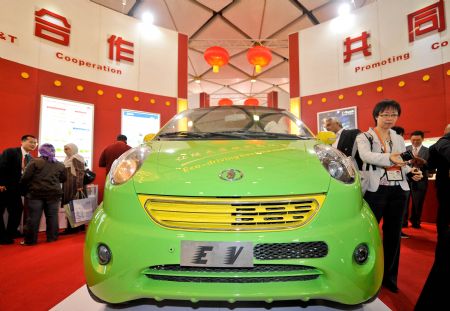 An electric vehicle is on display during an exhibition showcasing Chinese innovative technologies and products in Cairo, capital of Egypt, on December 3, 2009. More than 180 new technologies and products with Chinese proprietary innovations highlighted the three-day exhibition, kicking off here on Thursday.