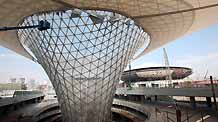 Photo taken on November 14, 2009 shows the horn-shakped 'Sunny Valley' building of Expo Axis in Shanghai, east China. A great amount of energy saving equipments were employed in the construction of 2010 Shanghai World Expo.