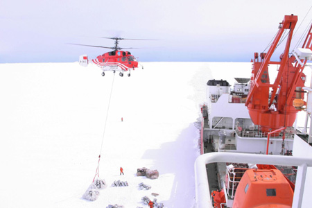 The helicopter 'Snow Eagle', from China's Antarctic exploration team carried out its first operation on Monday, transferring goods from the icebreaker Xuelong, or Snow Dragon, to the Zhongshan Station in eastern Antarctica.