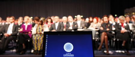 Delegates attend the opening of the United Nations Climate Change Conference 2009, also known as COP15, at the Bella center in Copenhagen December 7, 2009.