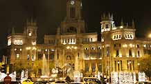 Photo taken on December 7, 2009 shows the decorations on the city government building and the Plaza Cibeles in Madrid, capital of Spain. With the Christmas drawing near, authorities of Madrid decorated the city with light bulbs to enhance the festive atmosphere.