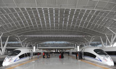 The test-running trains prepares for their first journey at the station in Guangzhou, capital of south China's Guangdong Province, December 9, 2009.