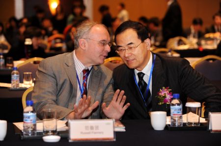 Guests communicate at an interval during the Forbes China Wealth Management Forum held in Qingdao, east China&apos;s Shandong Province, December 10, 2009.