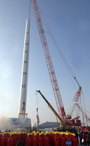 A huge wind turbine is installed in Dabancheng of northwest China's Xinjiang Uygur Autonomous Region on December 10, 2009. The turbine, part of a wind power station, will contribute to the first all-China-developed wind power station that will have an installed capacity of 3 megawatts upon its completion.