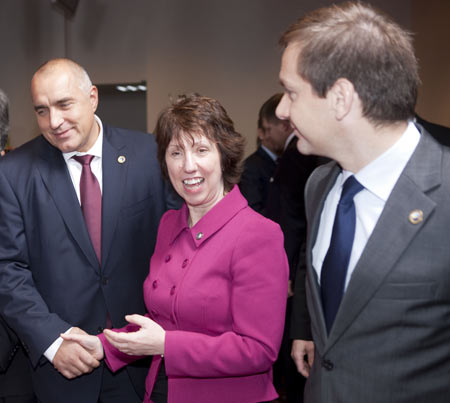 Bulgarian Prime Minister Boiko Borisov (L), EU High Representative for Foreign Affairs and Security Policy Catherine Margaret Ashton (C) and Hungarian Prime Minister Gordon Bajnai talk with each other after a family photo at the EU headquarters in Brussels, capital of Belgium, December 10, 2009.