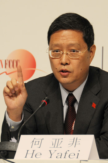 China's Vice Foreign Minister He Yafei speaks during a news conference about China's stand on global climate change, in Copenhagen, capital of Denmark, December 11, 2009.
