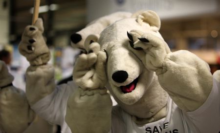 Environmentalists wearing polar bear costumes attend a demonstration at the Bella center of Copenhagen, capital of Denmark, December 14, 2009, during the UN Climate Change Conference.
