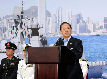 Donald Tsang Yam-kuen, chief executive of the Hong Kong Special Administrative Region, addresses the welcome ceremony of the Chinese naval 3rd escort fleet, in Hong Kong, south China, on December 14, 2009.