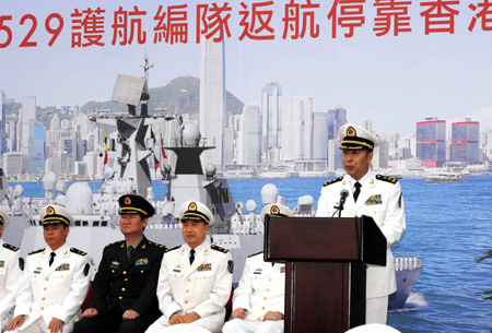 Liu Xiaojiang, political commissar of the navy of Chinese People's Liberation Army, addresses the welcome ceremony of the Chinese naval 3rd escort fleet, in Hong Kong, south China, on December 14, 2009. 