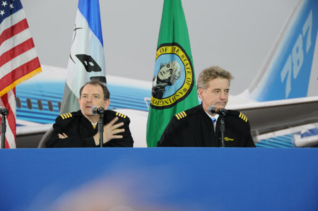 Boeing test pilot Mike Carriker (R) and first officer Randy Neville speak to the media after landing the 787 Dreamliner jet at Paine Field near Boeing's plant in the western state of Washington, the United States, Dec. 15, 2009. 