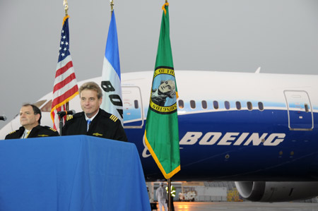 Boeing test pilot Mike Carriker (R) and first officer Randy Neville speak to the media after landing the 787 Dreamliner jet at Paine Field near Boeing's plant in the western state of Washington, the United States, Dec. 15, 2009.