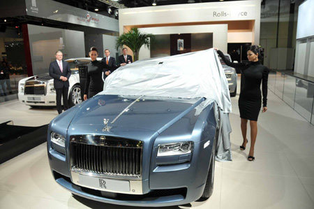 A new Rolls Royce car sedan is revealed during the media day of the 10th Dubai Motor Show in Dubai, the United Arab Emirates, on December 15, 2009.