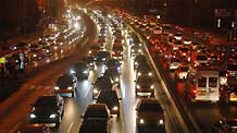 The photo taken on Decemeber 15, 2009 shows the vehicle flow on the West Second Loop Road in Beijing.