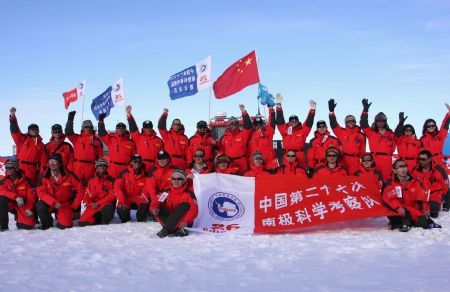 Some members of China's expedition team pose for the photo before their journey in Zhongshan station, Antarctica, December 18, 2009. China's expedition team sent two teams to the inland of Antarctica on Friday. One team headed to China's Kunlun Station, the other one went to the Grove Mountains.