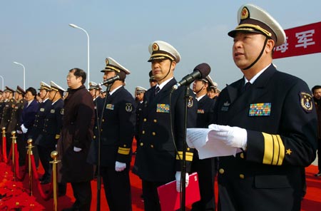 A welcoming ceremony is held in honour of 'Zhoushan' and 'Xuzhou' warships upon their return to their home port in Zhoushan, Zhejiang Province, December 20, 2009. 