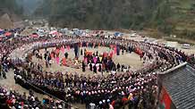 People of the Miao ethnic group perform traditional dance during the closing celebration of the Guzang Festival at Wuliu Village in Leishan County, southwest China's Guizhou Province, December 19, 2009.