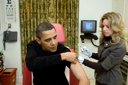 A White House nurse prepares to administer the H1N1 vaccine to US President Barack Obama at the White House on Sunday, December 20, 2009.