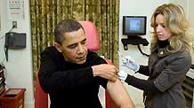 A White House nurse prepares to administer the H1N1 vaccine to US President Barack Obama at the White House on Sunday, December 20, 2009.