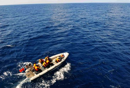  Chinese navy soldiers participate in a training on Ma'anshan frigate of the fourth Chinese naval flotilla in the Gulf of Aden, December 16, 2009. 