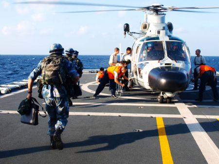 Chinese navy soldiers participate in a training on Ma'anshan frigate of the fourth Chinese naval flotilla in the Gulf of Aden, December 16, 2009. 