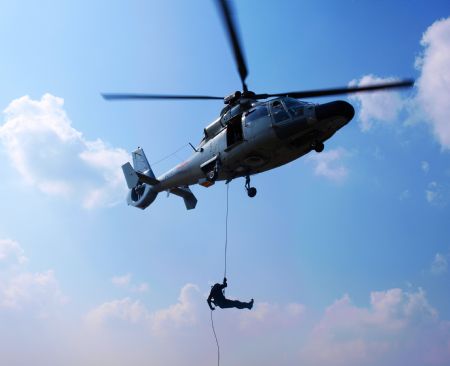 Chinese navy soldiers participate in a training on Ma'anshan frigate of the fourth Chinese naval flotilla in the Gulf of Aden, December 16, 2009. 