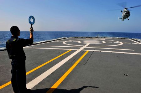 Chinese navy soldiers participate in a training on Ma'anshan frigate of the fourth Chinese naval flotilla in the Gulf of Aden, December 16, 2009. 