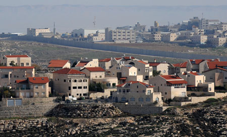 Photo taken on December 28, 2009 shows Jewish houses at Neve Ya'akov, East Jerusalem. Israel Construction and Housing Ministry is seeking bids for construction of 692 new apartments in East Jerusalem, a ministry spokesman said on Monday.