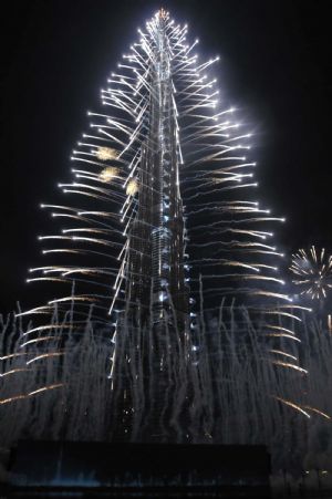 Fireworks explode around the Burj Khalifa tower during its opening ceremony in Dubai, the United Arab Emirates, January 4, 2010. 