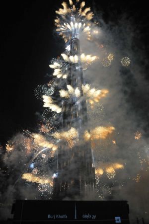 Fireworks explode around the Burj Khalifa tower during its opening ceremony in Dubai, the United Arab Emirates, January 4, 2010. 