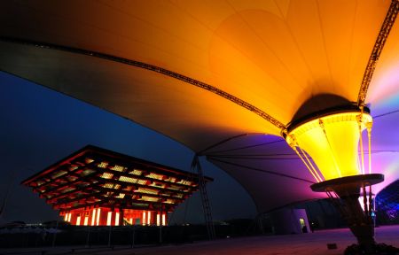 Photo taken on January 7, 2010 shows the brillant cable-membrane structure of the Expo Axis during a trial illumination in Shanghai, east China. 