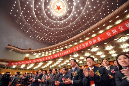 Attendees applaud during China's State Top Scientific and Technological Award ceremony at the Great Hall of the People in Beijing, capital of China, on January 11, 2010. 