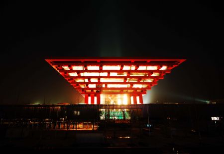 Photo taken on January 12, 2010 shows the scenery of the Expo Axis during a trial illumination in the Expo Park in Shanghai, east China. 