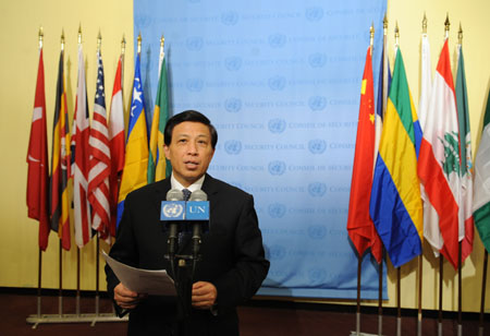 The Chinese permanent representative to the United Nations Zhang Yesui, who holds the rotating Security Council presidency for January, reads a statement at the UN headquarters in New York, Jan. 13, 2010. Zhang said that the Council members "express their strong support for the government and people of Haiti in the aftermath of this devastating earthquake, and their strong support for international efforts to assist Haiti during the immediate and critical rescue and recovery efforts of the coming days." (Xinhua/Shen Hong)