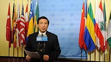The Chinese permanent representative to the United Nations Zhang Yesui, who holds the rotating Security Council presidency for January, reads a statement at the UN headquarters in New York, January 13, 2010..