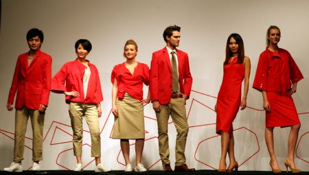 Models present working suits of Norway Pavilion in Shanghai, east China, January 11, 2010. 