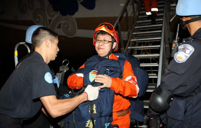 A Chinese emergency rescue team arrives at the airport in Haitian capital Port-au-Prince on January 14, 2010. 