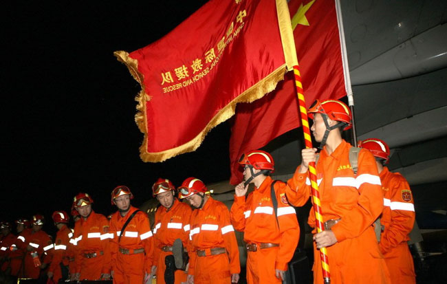 A Chinese emergency rescue team arrives at the airport in Haitian capital Port-au-Prince on January 14, 2010. 