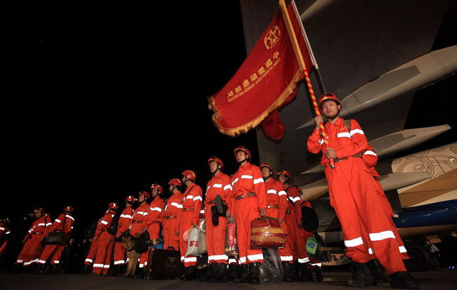 A Chinese emergency rescue team arrives at the airport in Haitian capital Port-au-Prince on January 14, 2010. 