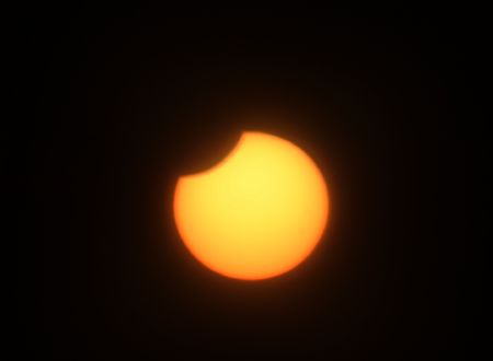 The partial eclipse of sun is seen in Minqin County of northwest China&apos;s Gansu Province, Jan. 15, 2010.