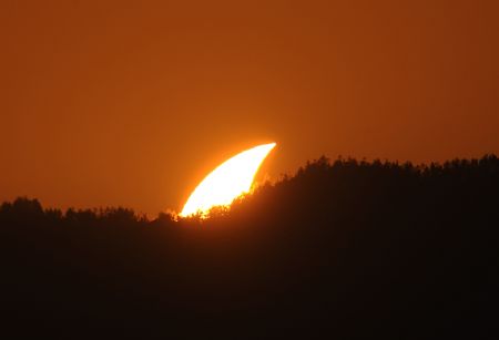 A partial eclipse of sun is seen in Fuzhou, capital of southeast China&apos;s Fujian Province, Jan. 15, 2010.
