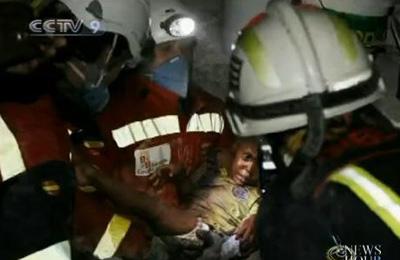 In another encouraging story of survival, a 2-year-old boy was pulled from a collapsed home in Port-au-Prince. (CCTV.com)
