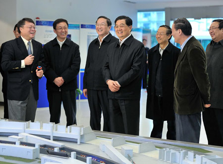 Hu Jintao (4th R), general secretary of the Central Committee of the Communist Party of China, Chinese president and chairman of the Central Military Commission, inspects Shanghai Synchrotron Radiation Facility (SSRF) project, in Shanghai, east China, on January 16, 2010. 