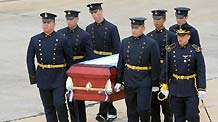 The coffin of Argentina's UN peace-keeping soldier Gustavo Gomez, killed in the huge quake measuring 7.3 on the Richter scale that rocked Haiti on January 12, is taken back to Buenos Aires, capital of Argentina, January 18, 2010.