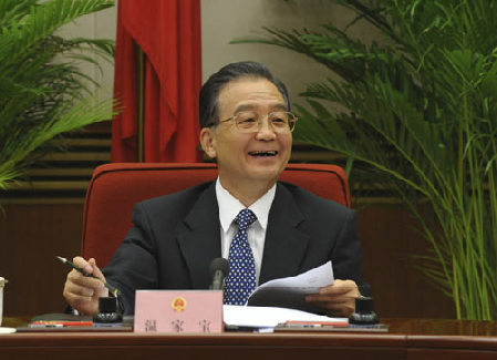 Chinese Premier Wen Jiabao presides over a plenary meeting of the State Council to discuss the draft of the government work report to be delivered at a national session of the country's parliament in Beijing, capital of China, January 19, 2010.