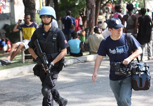 Tian Jiang, a member of Chinese formed police unit in Haiti, patrols in Port-au-Prince, Haiti, January 19, 2010.
