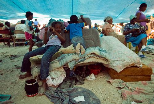 Kids play at a makeshift shelter in Port-au-Prince, Haiti, January 22, 2010.