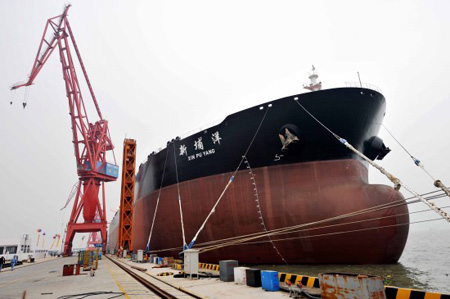 Xin Pu Yang, the most sophisticated supertanker ever designed and built by a Chinese shipyard, docks at Guangzhou, south China's Guangdong Province, January 22, 2010. 